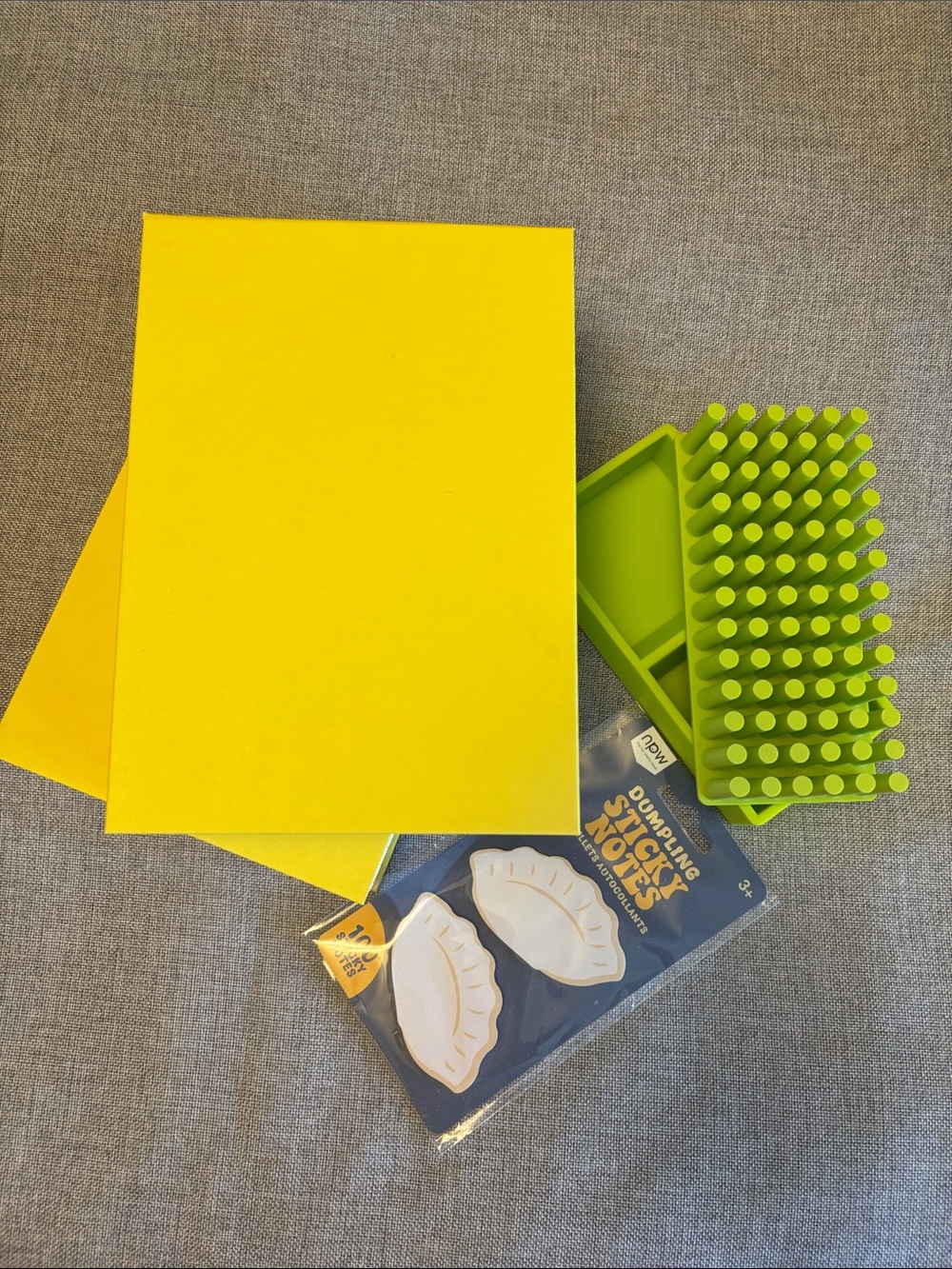 Desks set includes yellow storage boxes & Poppin accessories.